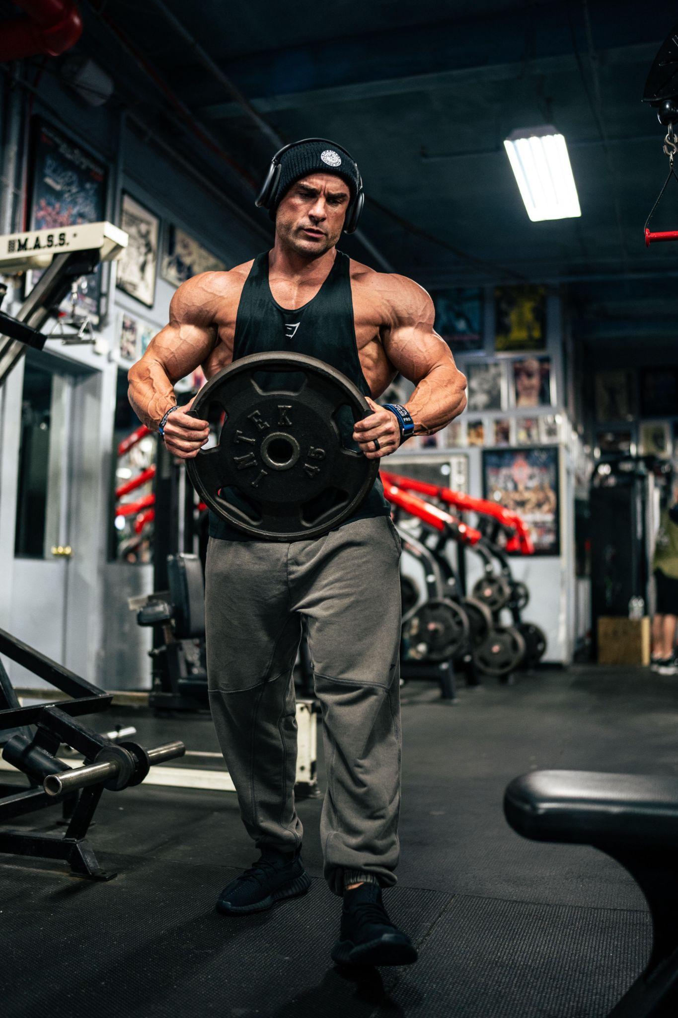 Body builder Ryan Terry working out in the gym