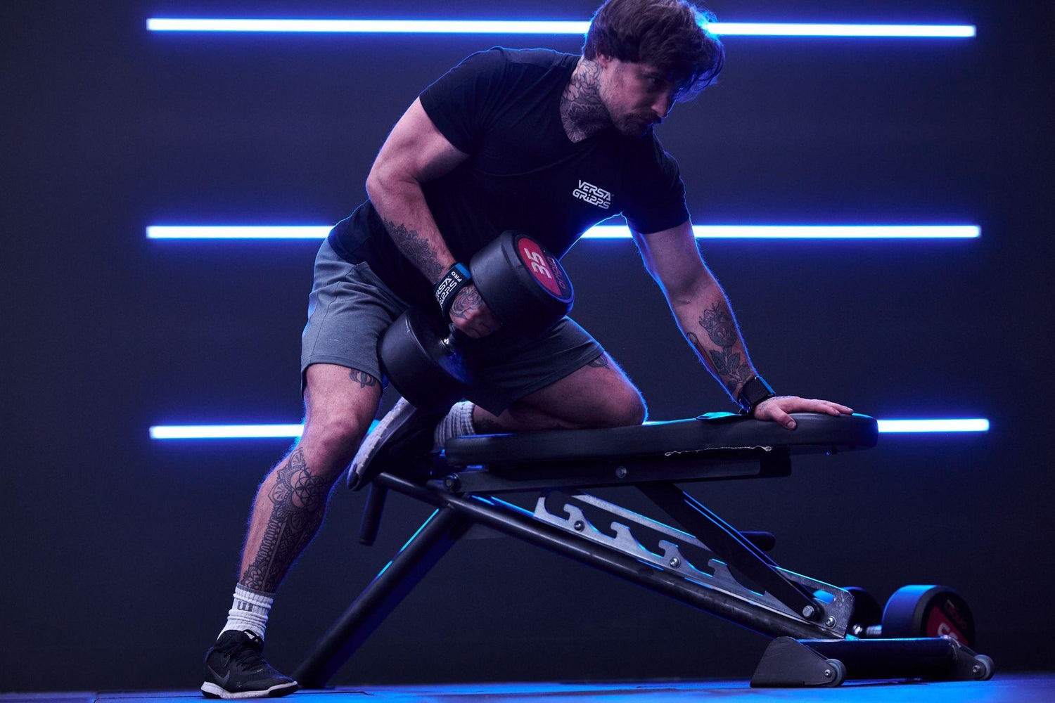 Male weightlifter using Versa Gripps in his daily gym routine