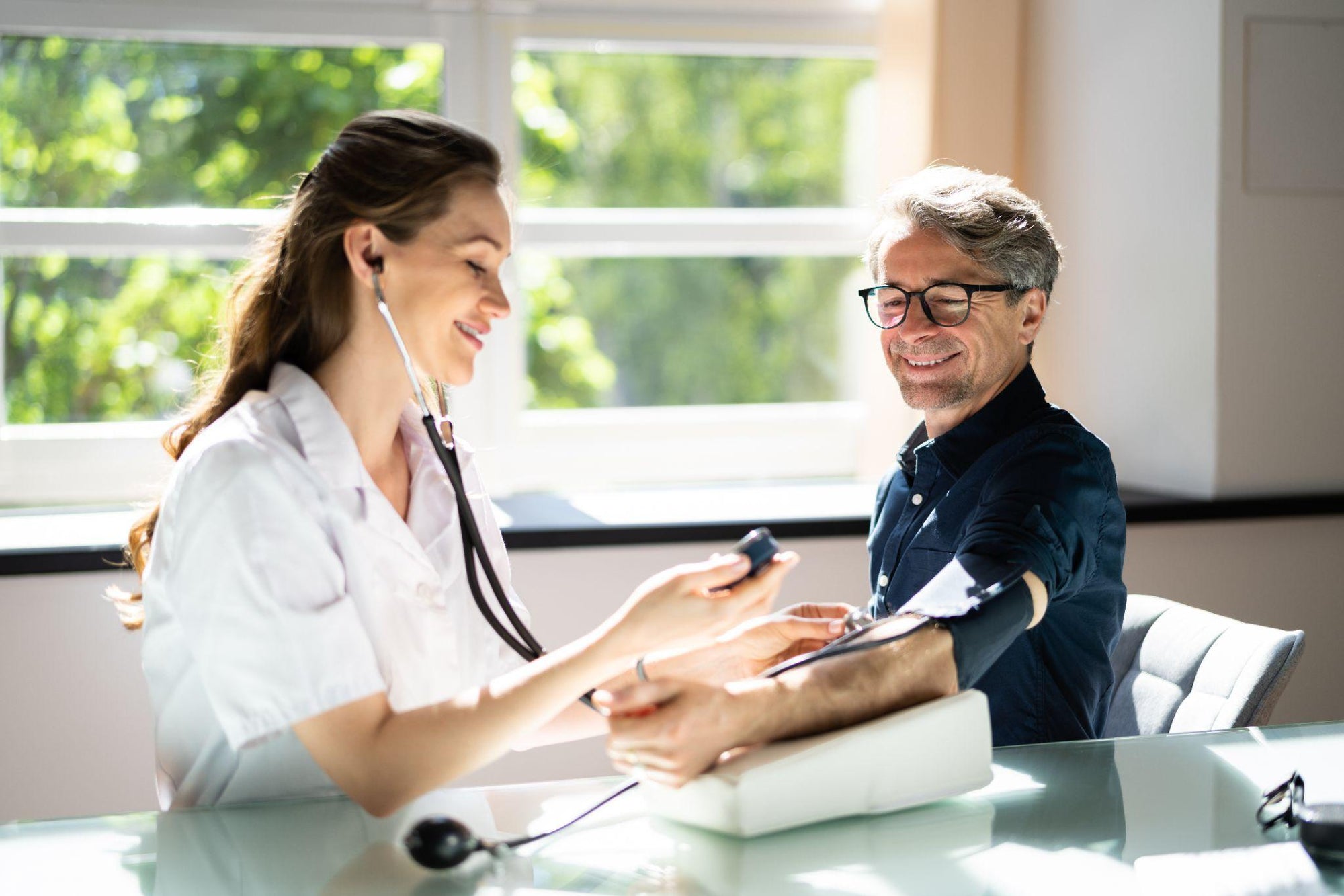 Man getting his blood pressure checked at the doctor