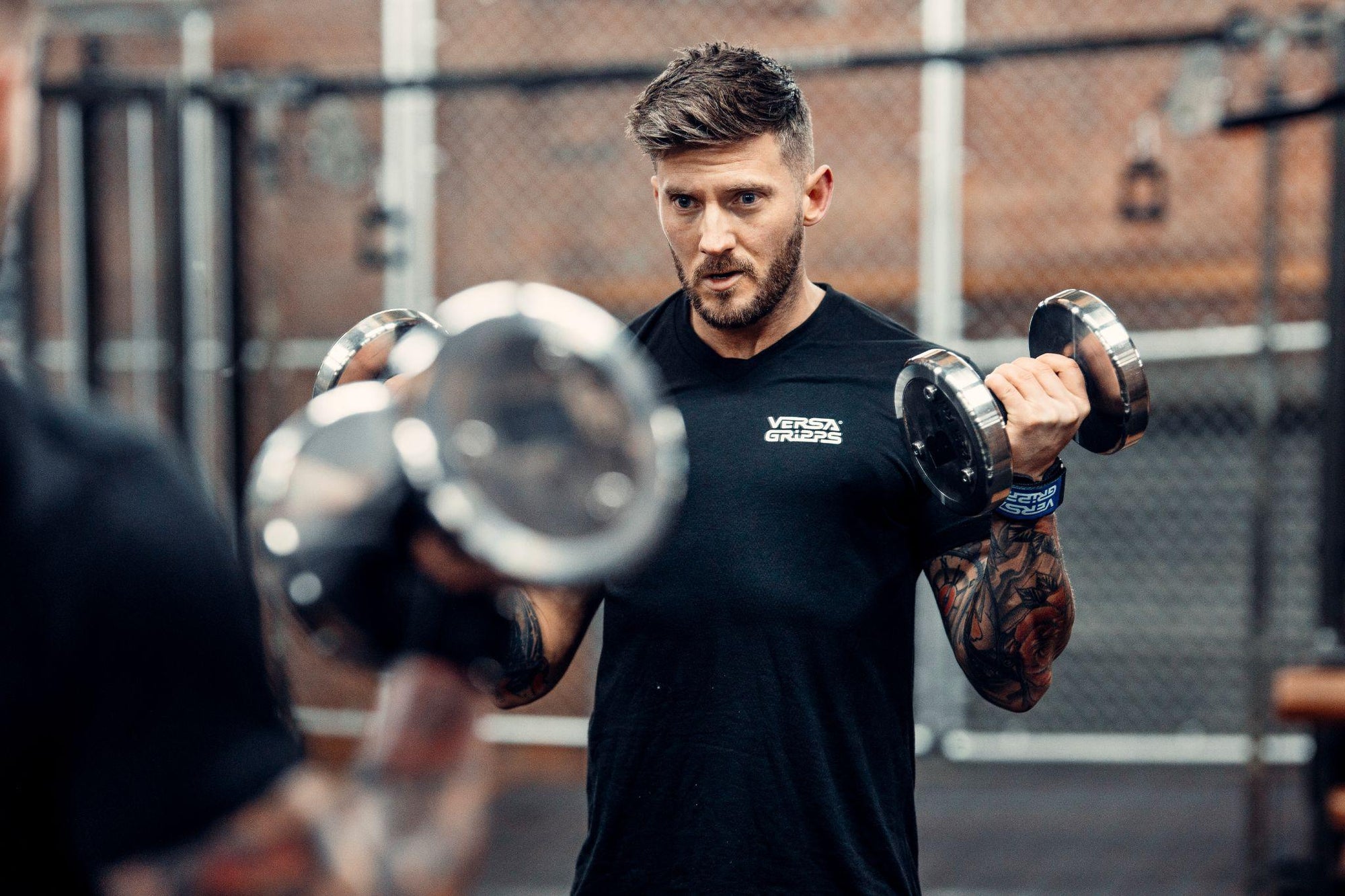 Weightlifter protecting his wrists in the gym using Versa Gripps